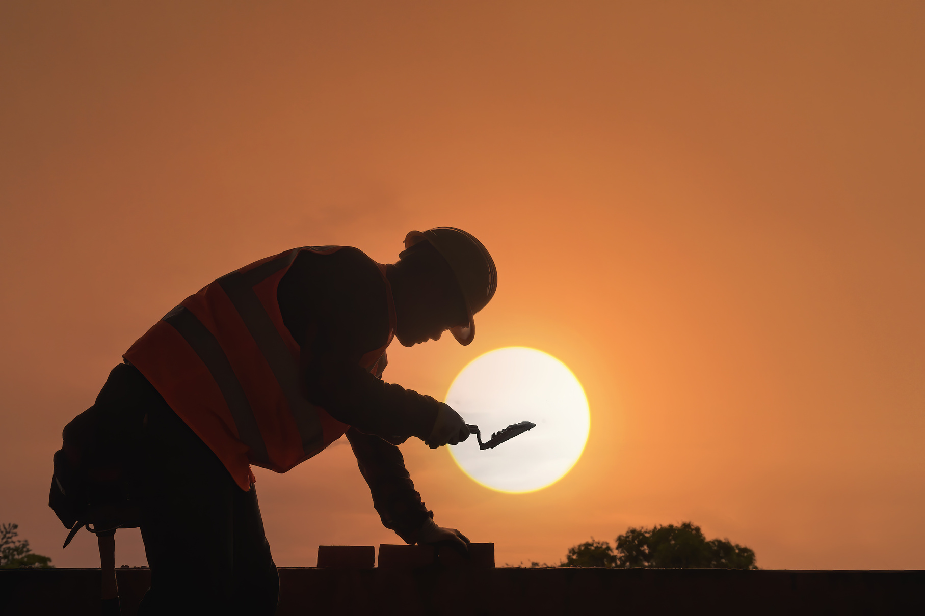 Construction Worker at Sunset